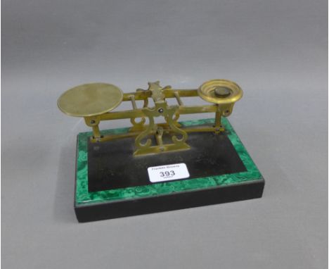 Samson Mordan &amp; Co brass postal scales on a black hardstone base with malachite border, 18cm long 