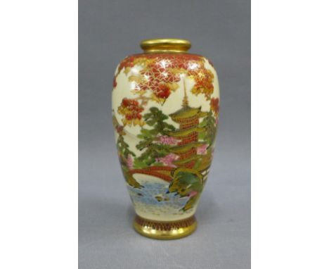 Japanese Satsuma baluster vase, painted with pagoda and landscape, signed, 13cm high 