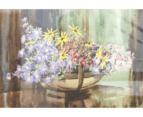 C.V. Parker (20th. C), watercolour, Still life of flowers in a trug, signed, 40 x 59cm