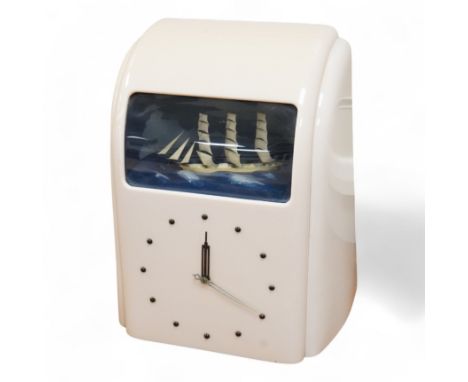 An Art Deco Bakelite Vitascope automaton mantel clock, 32cm high