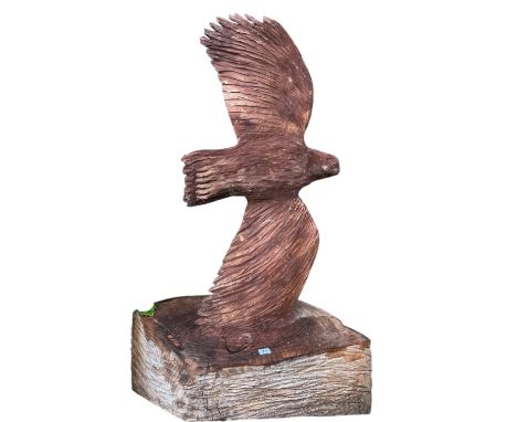 A chainsaw carving of an eagle in flight, height 170cm