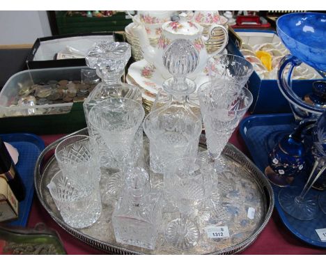 Two Whiskey Decanters Plus Two Glasses, five fluted glasses, scent bottle, plated oval tray.