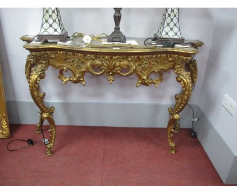 XVIII Century Style French Gilt Rococo Console Table, with glass top, frieze with C scroll and foliage decoration on shaped C
