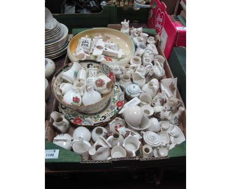 Crested Ware, including Broomsgrove Grenade, Arbroarth pig, Carlton Ware yacht, approximately sixty-six pieces plus mini tea 