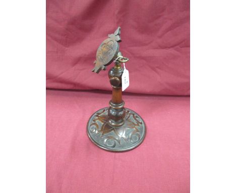 Late XIX Century Walnut Table Top Wig Stand, with height and lever adjusters on pokerwork circular base.Top with one bit miss