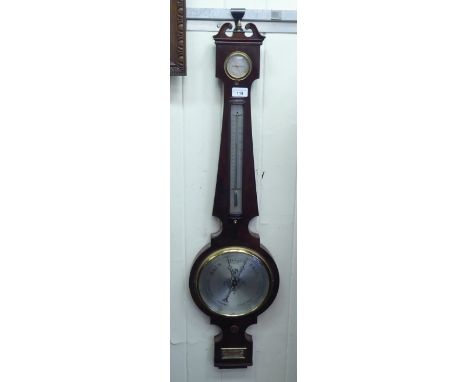 A 19thC mahogany cased wheel barometer, incorporating a hygrometer, thermometer and level, inscribed JB Pedrone, Shrewsbury&n