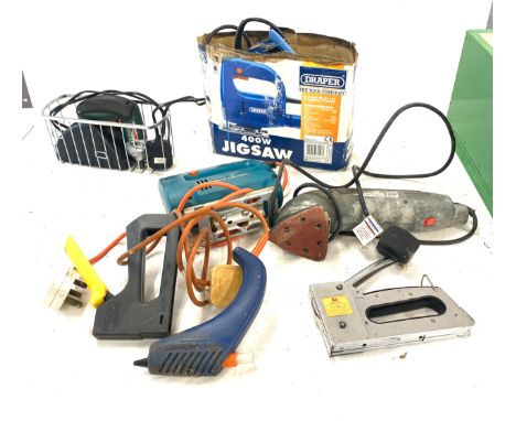 Selection of power tools including glue gun, sander, jigsaw 