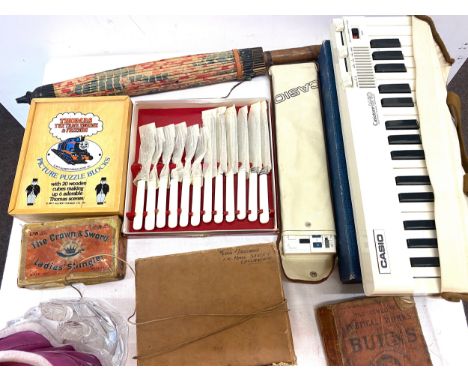 Selection of miscellaneous items to include vintage sun parasol, glass mask, Casio keyboard M10, Casio Vl Tone, Thomas the Ta