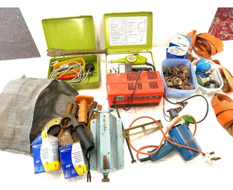 Large selection of tools to include rachet straps, chisels, battery charger etc 