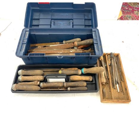 Plastic tool box with contents such as chisels etc 