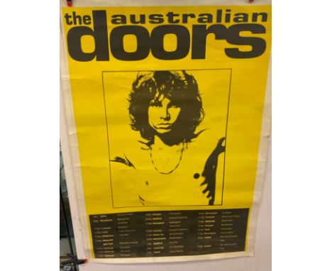 Selection of vintage music posters includes the australian doors,the times they are a changin bob dylan poster, eagles live p