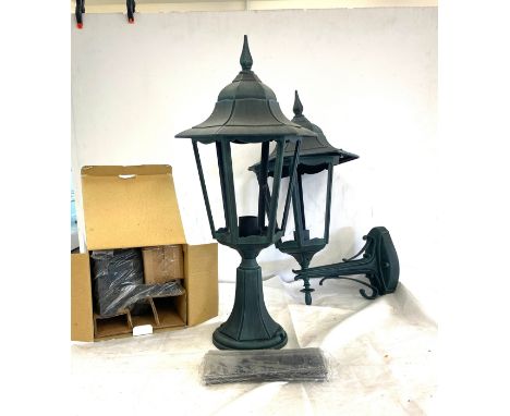 Two boxed massive wall mounted outdoor security light and one flood light 