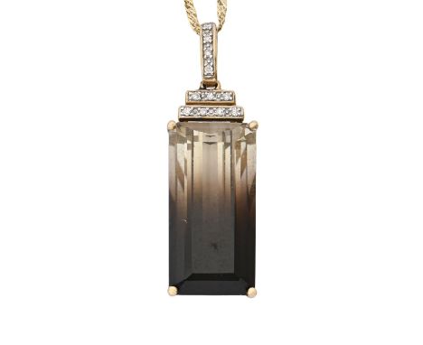 A step cut tourmaline and diamond pendant, in gold, 26mm, marked 375, on gold necklet, 4.7g Good condition