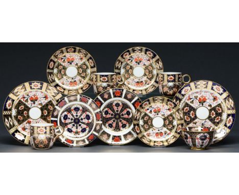 A Royal Crown Derby Imari pattern teacup, saucer and plate, late 20th c, plate 16cm diam, printed mark and three Staffordshir