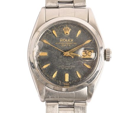 A Rolex stainless steel gentleman's wristwatch, Oyster Perpetual Date, with black dial, 33mm diam, maker's bracelet Good cond