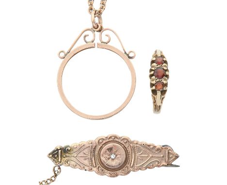 An Edwardian chip diamond bar brooch, in 9ct gold, 38mm l, Birmingham 1901, a garnet ring in 9ct gold and a gold coin mount, 