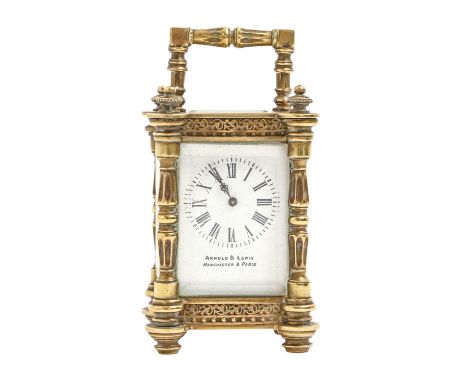 A French miniature brass carriage timepiece, Arnold and Lewis Manchester &amp; Paris, c1900, with enamel dial, in ornate case