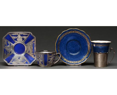 A Copeland gilt bordered powder blue ground bone china coffee cup and saucer, c1920, with engine turned silver cup holder, sa