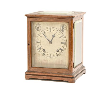 A German mahogany clock, c1910, with silvered dial and CHIME / SILENT and regulation rings, the movement with platform escape