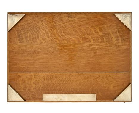 A George V silver mounted oak blotter, engraved PRESENTED TO THE OFFICERS 2ND ROYAL ENNISKILLEN FUSILIERS BY CAPT N. F. R. LL
