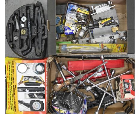 Miscellaneous tools and car parts, including stereos, wheel brace, Jaguar hub caps, etc 