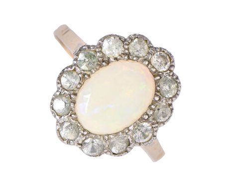 An opal and white stone cluster ring, gold hoop marked 9ct SIL, 2.4g, size P Good condition