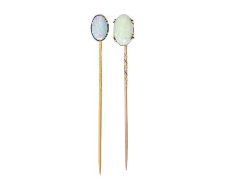 Two gold stickpins with opal terminal, early 20th c, head 11 and 13mm, one marked 9ct, 3.4g Larger opal with faint hairline c