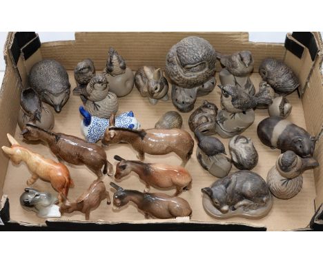 Five Beswick models of donkeys, various dates, mixed sizes and colours, the largest 17cm l, printed marks, a Poole stoneware 