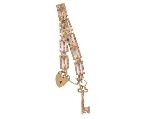 A 9ct gold gate bracelet, padlock and key charm, bracelet 14cm l, 9g Good condition