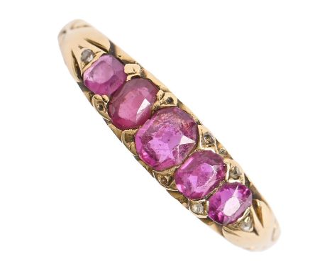 A five stone ruby ring, early 20th c, with diamond accents, in gold, 3.1g, size M½ Worn and lacking several of the diamond ac