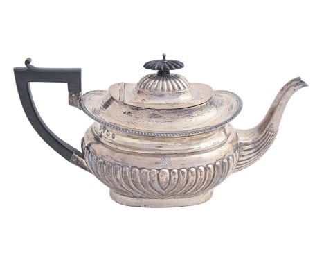 An Edwardian silver teapot, 16cm h, by Williams (Birmingham) Ltd, Birmingham 1906, 20ozs 10dwts Good condition, engraved with