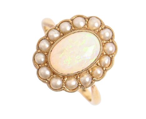 An opal and split pearl cluster ring,&nbsp;in gold marked 18ct, 4.1g, size L½ Good condition. Opal of good polish