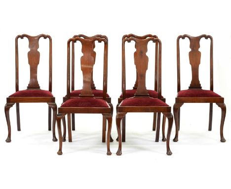 A set of six walnut spoon back dining chairs, c1920, in Queen Anne style Light handling wear to crest rails