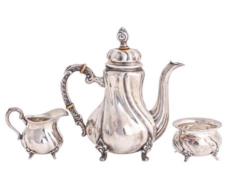 A German silver three-piece tea service, 20th c, wrythen fluted, teapot 18cm h, by Gayer &amp; Krauss, 15ozs 2dwts Good condi