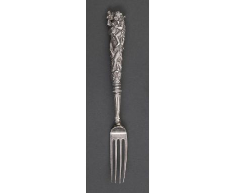 A fine William IV silver fruit fork, London, 1832,&nbsp;the sculptural handle cast and chased with putti and scrolling acanth