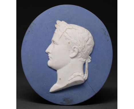 A French biscuit porcelain portrait medallion of Napoleon Bonaparte, early 19th c, 16.5cm, indistinctly marked ... Imp 1809, 
