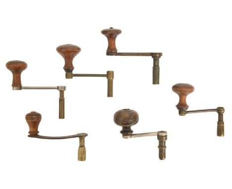 Six George III and later steel and brass longcase clock keys, with wooden knobs, various sizes All usable, several      colou