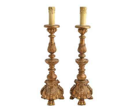 A pair of carved and gilded wood table lamps, in 16th c style, 51cm h excluding lamp holder Good condition