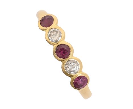 A five stone ruby and diamond ring, in 18ct gold, Sheffield 1989, 4.2g, size R Wear to rub over settings