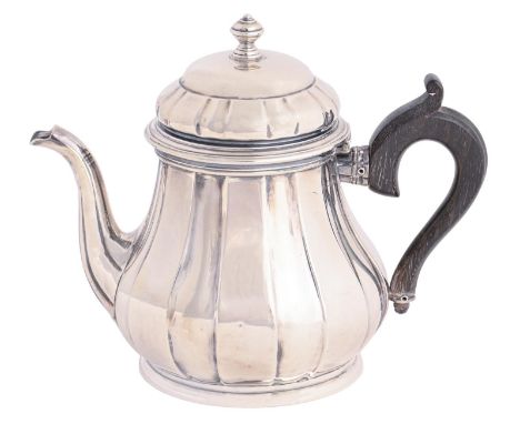 A French silver teapot, of 'pleated' baluster shape, 13cm h, by Bucheron Paris, maker's mark and BUCHERON PARIS - LONDRES, im