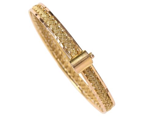 A gold bangle, distorted, marked N88 14, 12g 