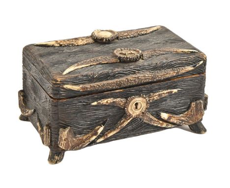 A German antler-mounted carved and stained softwood tea chest, mid 19th c, 27cm l Complete and, but for light wear and some d
