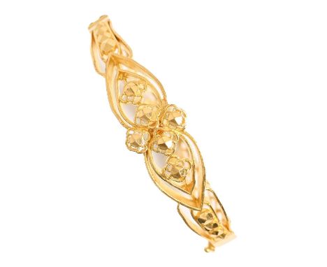 A Chinese gold bangle, 20th c, 55mm (internal), marked 900 9999 and in Chinese, 34.3g Good condition