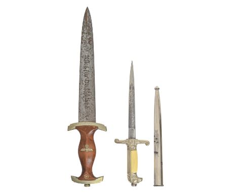 A German, Third Reich SS dagger, Rudolf Buchel Solingen, the crossguard stamped Ns, blade 22cm l and a Romanian (Kingdom) off