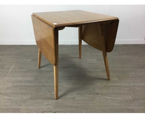 ERCOL DROP LEAF DINING TABLE,137cm x 74cm extendedCondition report: Overall good condition some minor scratches and stains to