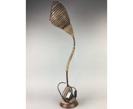 FIGURAL TABLE LAMP,modelled as a fairy, 39cm high, 30cm wide, along with a brass table lamp and another (3)