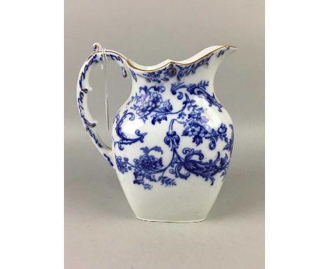 LATE 19TH CENTURY CAULDON BLUE AND WHITE TOILET SET,comprising two ewers and basins, the larger ewer 29cm high, also a slop b