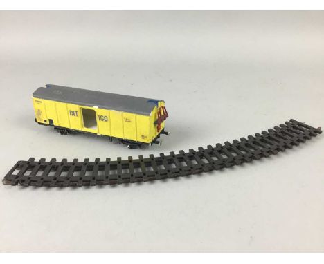 LOT OF VINTAGE MODEL RAILWAY TRACK AND CARRIAGES,also tin plate toy road sections, and a tinplate terrestrial globe