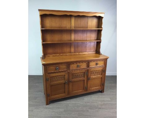 MODERN OAK WELSH DRESSER,136cm wideCondition report: Scratches present at top of the dresser as well as some small chips the 