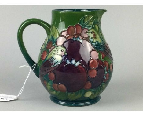 MODERN MOORCROFT JUG,15cm high, along with a modern Moorcroft table lamp (2)Condition report: 51cm high. No damage to the lam